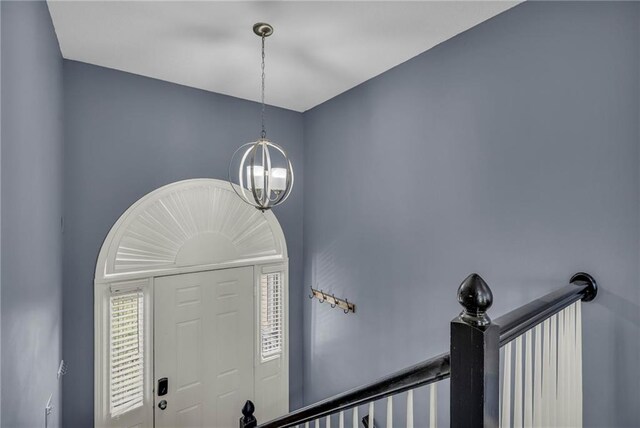 3708 N 112th St, Kansas City, KS 66109 - foyer entrance with a chandelier