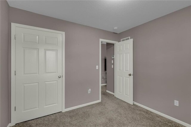 3708 N 112th St, Kansas City, KS 66109 - unfurnished bedroom featuring carpet flooring and baseboards