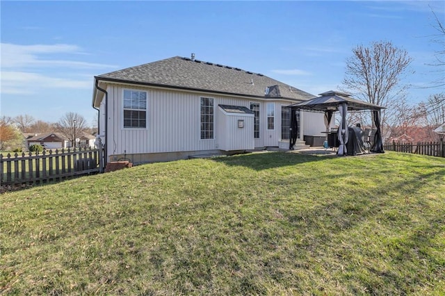 3708 N 112th St, Kansas City, KS 66109 - rear view of property with a gazebo and a shingled roof