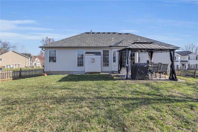 3708 N 112th St, Kansas City, KS 66109 - rear view of property with a gazebo, a patio, and roof with shingles