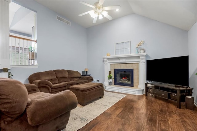 616 N Winwood Ter, Gardner, KS 66030 - living area with ceiling fan, wood finished floors, a tile fireplace, and lofted ceiling