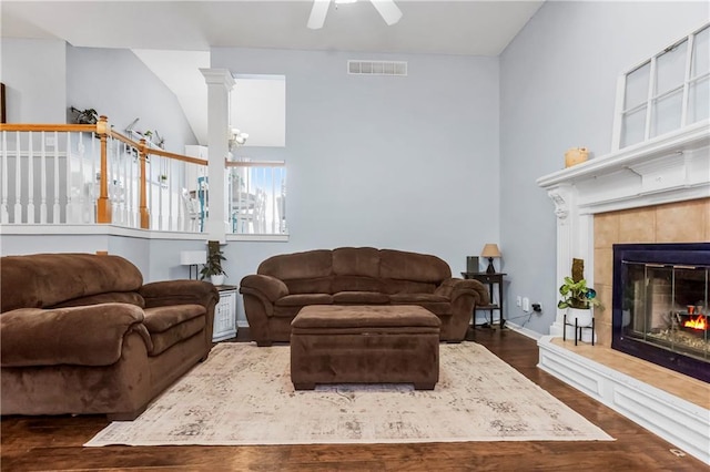 616 N Winwood Ter, Gardner, KS 66030 - living area with a ceiling fan, dark wood-type flooring, and a fireplace
