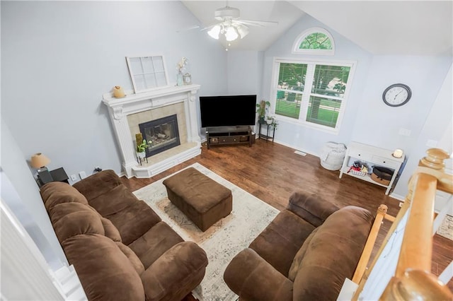616 N Winwood Ter, Gardner, KS 66030 - living area with a ceiling fan, wood finished floors, a fireplace, high vaulted ceiling, and baseboards