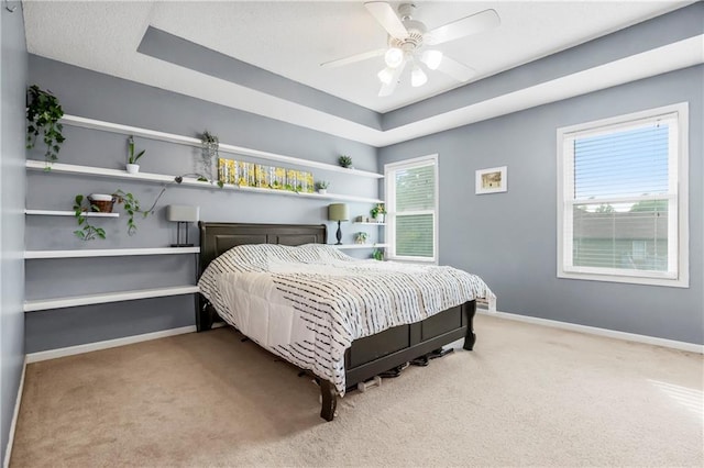 616 N Winwood Ter, Gardner, KS 66030 - bedroom with carpet flooring, baseboards, and a ceiling fan