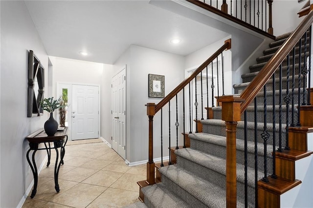 7918 W 118th Pl, Overland Park, KS 66210 - entrance foyer with stairway, recessed lighting, and light tile patterned floors