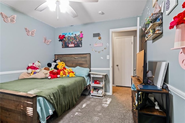 10538 Cleveland Ave, Kansas City, MO 64137 - carpeted bedroom featuring a ceiling fan and baseboards