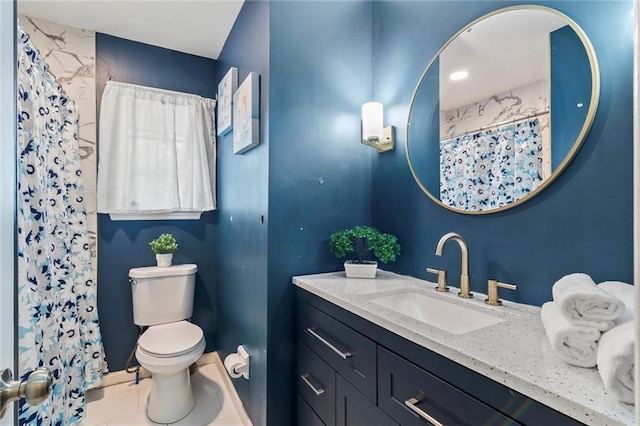 10538 Cleveland Ave, Kansas City, MO 64137 - full bathroom with vanity, tile patterned flooring, and curtained shower