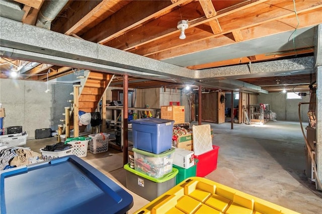 10538 Cleveland Ave, Kansas City, MO 64137 - unfinished below grade area featuring stairway