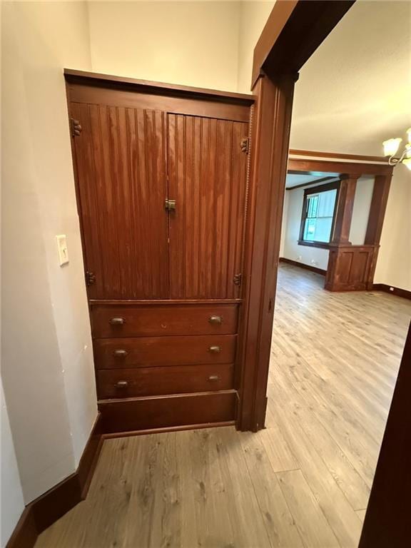 347 Walnut St, Kidder, MO 64649 - detailed view of wood finished floors and baseboards