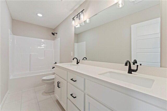 18232 W 166th St, Olathe, KS 66062 - full bathroom with toilet, double vanity, bathtub / shower combination, and baseboards