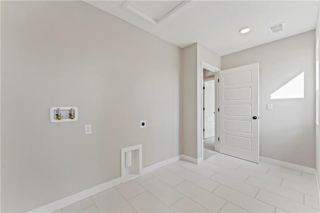 18232 W 166th St, Olathe, KS 66062 - unfurnished room with baseboards, attic access, and light tile patterned floors