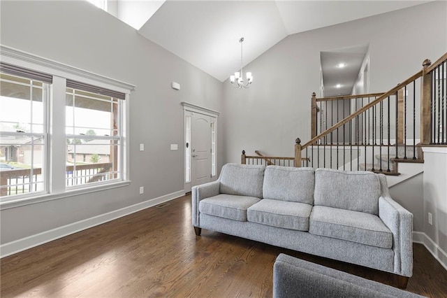 21419 W 47th Ter, Shawnee, KS 66218 - living room featuring a chandelier, dark wood-style flooring, stairway, high vaulted ceiling, and baseboards