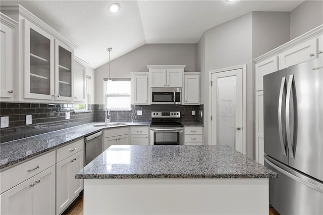 21419 W 47th Ter, Shawnee, KS 66218 - kitchen featuring stainless steel appliances, a sink, white cabinetry, and lofted ceiling
