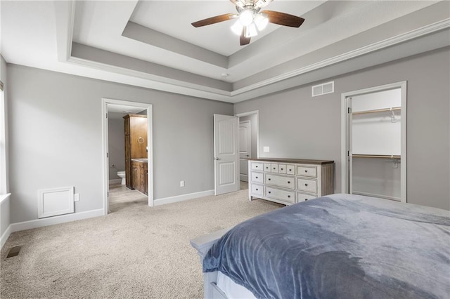 21419 W 47th Ter, Shawnee, KS 66218 - bedroom featuring baseboards, carpet floors, a raised ceiling, and connected bathroom
