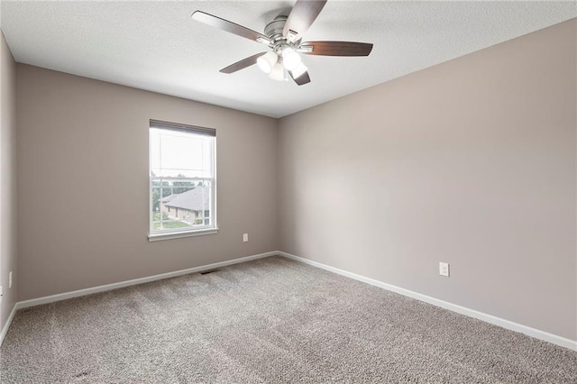 21419 W 47th Ter, Shawnee, KS 66218 - empty room with carpet flooring, a ceiling fan, baseboards, and a textured ceiling