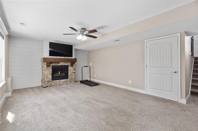 21419 W 47th Ter, Shawnee, KS 66218 - unfurnished living room featuring ceiling fan, a fireplace, carpet, and stairway