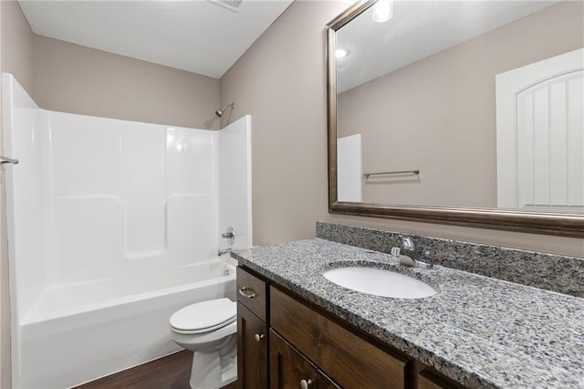21419 W 47th Ter, Shawnee, KS 66218 - full bath with vanity, toilet, bathing tub / shower combination, and wood finished floors