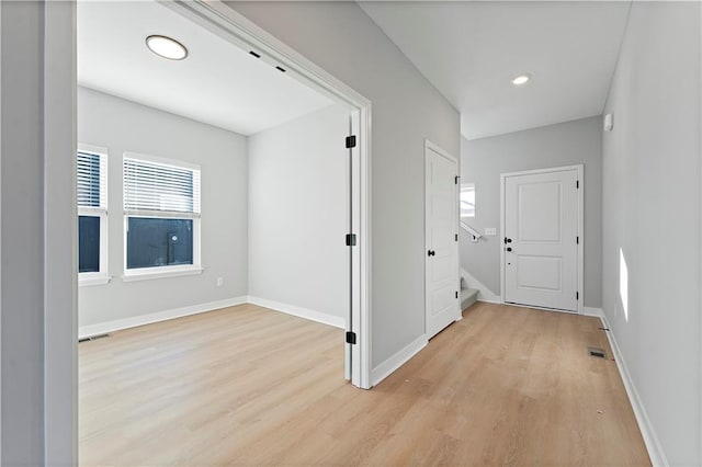 18257 W 166th St, Olathe, KS 66062 - corridor featuring light wood-style flooring, recessed lighting, and stairs
