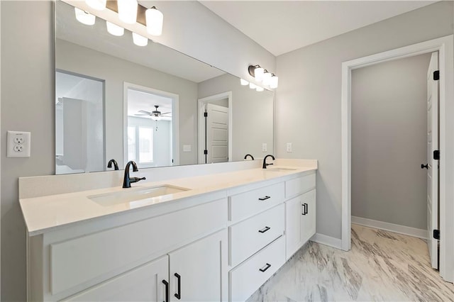 18257 W 166th St, Olathe, KS 66062 - bathroom with double vanity, marble look tiles, and a ceiling fan