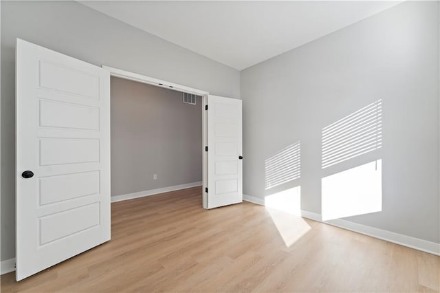 18257 W 166th St, Olathe, KS 66062 - empty room featuring light wood-style floors and baseboards