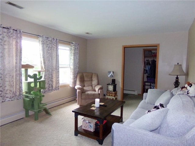4426 Shrine Park Rd, Leavenworth, KS 66048 - carpeted living room with a baseboard heating unit