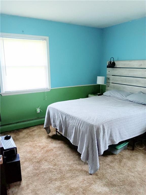 4426 Shrine Park Rd, Leavenworth, KS 66048 - carpeted bedroom featuring baseboard heating