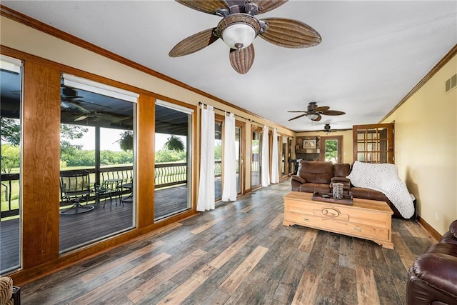 19819 Mclouth Rd, Tonganoxie, KS 66086 - sunroom / solarium featuring crown molding, wood finished floors, a deck, and baseboards