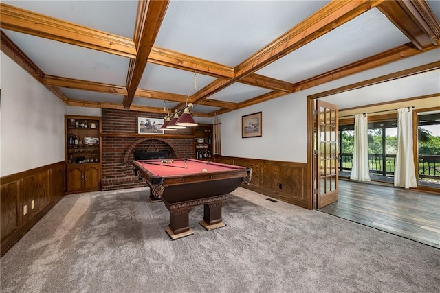 19819 Mclouth Rd, Tonganoxie, KS 66086 - recreation room with a wainscoted wall, coffered ceiling, beamed ceiling, carpet floors, and a brick fireplace