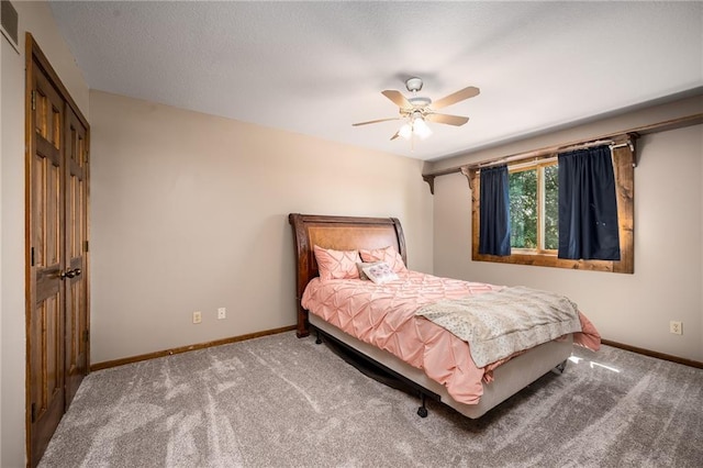 19819 Mclouth Rd, Tonganoxie, KS 66086 - carpeted bedroom featuring baseboards and a ceiling fan