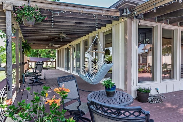 19819 Mclouth Rd, Tonganoxie, KS 66086 - deck featuring ceiling fan and outdoor dining space
