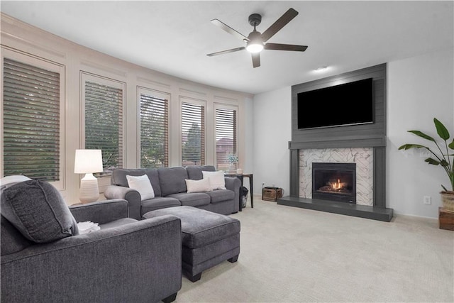 10154 N Lane Dr, Kansas City, MO 64157 - living room featuring a ceiling fan, a fireplace, and carpet floors