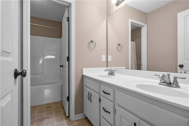 10154 N Lane Dr, Kansas City, MO 64157 - bathroom featuring double vanity and baseboards