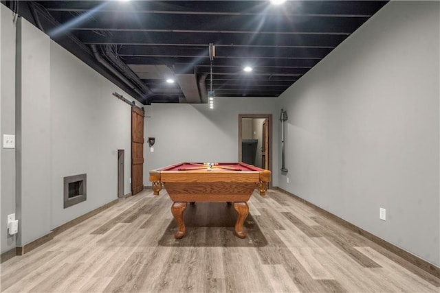 10154 N Lane Dr, Kansas City, MO 64157 - playroom with a barn door, wood finished floors, and pool table
