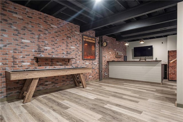 10154 N Lane Dr, Kansas City, MO 64157 - indoor wet bar with wood finished floors, brick wall, and beamed ceiling