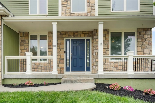 10154 N Lane Dr, Kansas City, MO 64157 - entrance to property with covered porch and stone siding