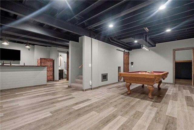 10154 N Lane Dr, Kansas City, MO 64157 - rec room featuring a barn door, wood finished floors, and billiards