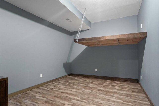 10154 N Lane Dr, Kansas City, MO 64157 - empty room featuring wood finished floors and baseboards