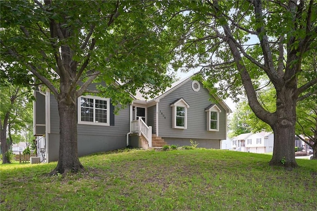 1609 NE Jade Ct, Lees Summit, MO 64086 - ranch-style house with central AC and a front lawn