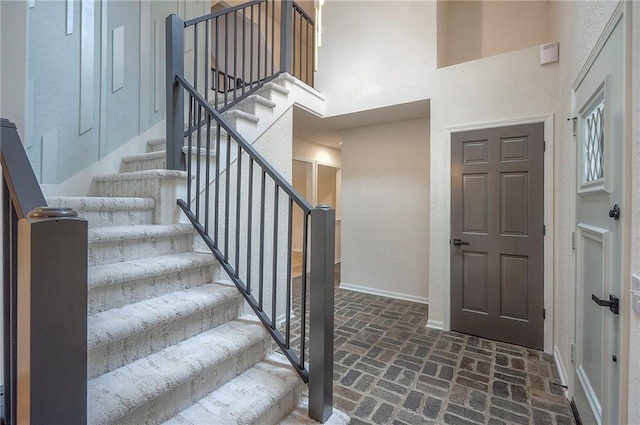 9100 Dearborn St, Overland Park, KS 66207 - entryway with brick floors and stairs