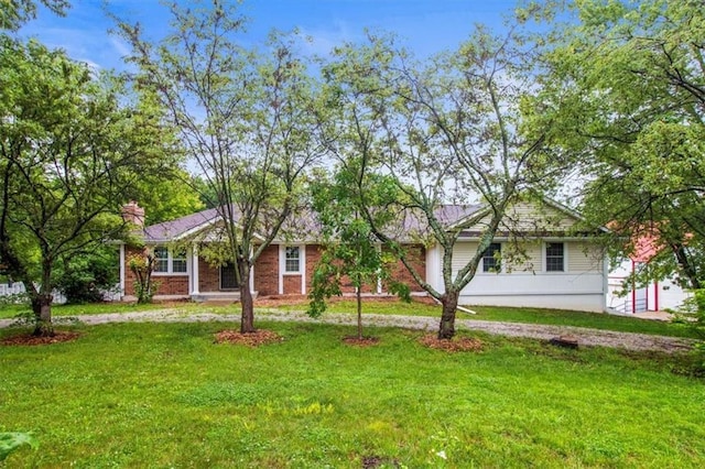 4188 Country Squire Ln, Oak Grove, MO 64075 - ranch-style house with a front yard