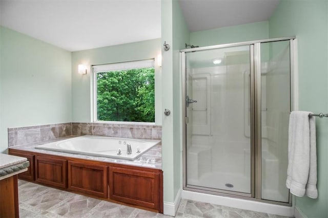 4188 Country Squire Ln, Oak Grove, MO 64075 - bathroom featuring a stall shower and a bath