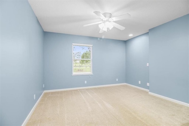 4188 Country Squire Ln, Oak Grove, MO 64075 - empty room with carpet flooring, a ceiling fan, and baseboards