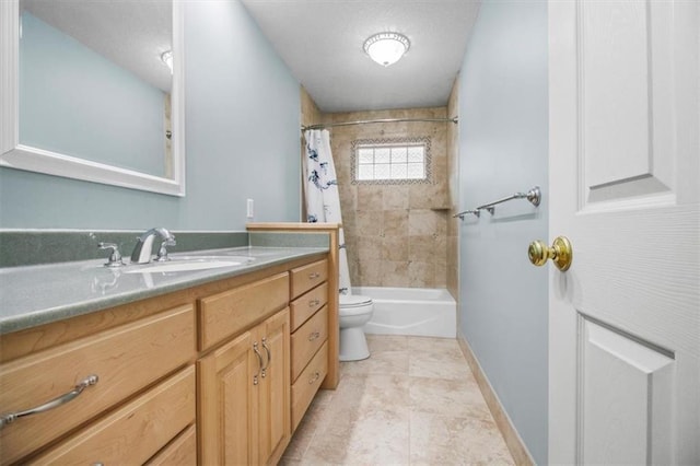 4188 Country Squire Ln, Oak Grove, MO 64075 - bathroom featuring vanity, toilet, shower / bath combo with shower curtain, and baseboards