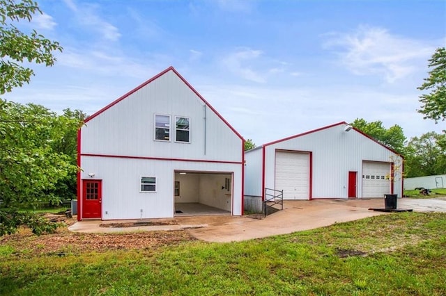 4188 Country Squire Ln, Oak Grove, MO 64075 - view of pole building featuring a lawn
