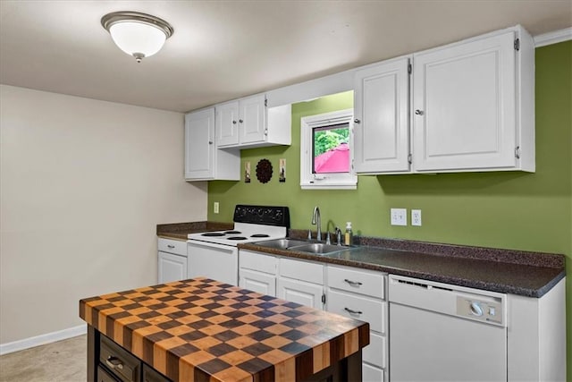 4400 Elledge Dr, Roeland Park, KS 66205 - kitchen with white appliances, a sink, white cabinets, and a center island