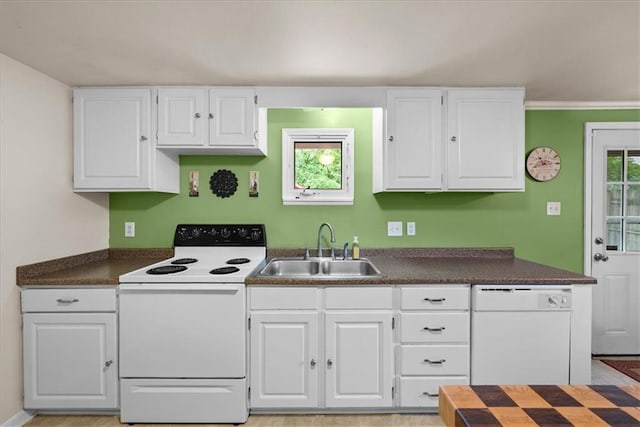 4400 Elledge Dr, Roeland Park, KS 66205 - kitchen featuring white appliances, a sink, white cabinets, and dark countertops