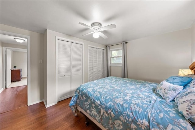 4400 Elledge Dr, Roeland Park, KS 66205 - bedroom featuring wood finished floors, baseboards, multiple closets, and ceiling fan