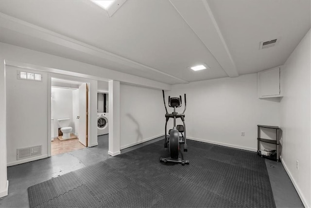 4400 Elledge Dr, Roeland Park, KS 66205 - exercise area with washer / clothes dryer and baseboards