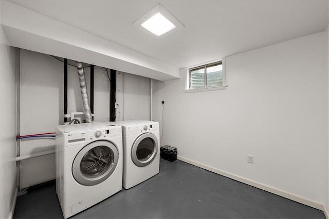 4400 Elledge Dr, Roeland Park, KS 66205 - laundry room featuring separate washer and dryer and baseboards