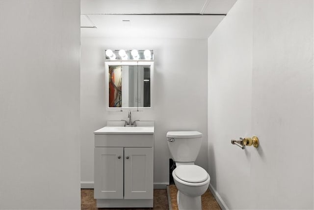 4400 Elledge Dr, Roeland Park, KS 66205 - bathroom featuring vanity, toilet, and baseboards